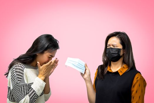 Asian pretty women wearing mask respiratory protection mask against epidemic flu covid19 or corona virus from wuhan in office with fear emotion in concept illness, outbreak, healthcare in life