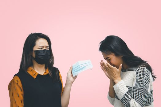 Asian pretty women wearing mask respiratory protection mask against epidemic flu covid19 or corona virus from wuhan in office with fear emotion in concept illness, outbreak, healthcare in life