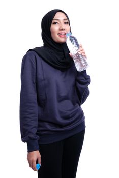Fitness Muslim Asian girl doing stretch exercise, on white background.