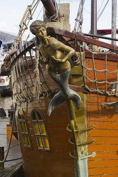 Mermaid Figurehead On Old Sail Ship. Vintage Retro Style