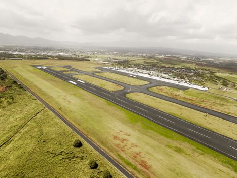 Aerial View Of Hilo International Airport Runway, Hawaii With Cloudy Sky