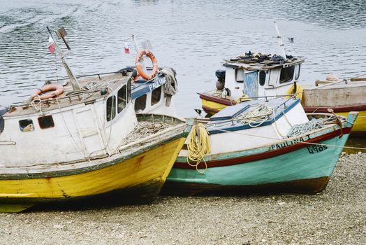 Small Old Fishing Boats On The Beach, Puerto Montt, Chile