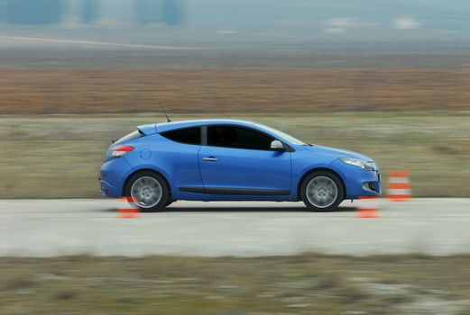 test drive a car at the test site with cones