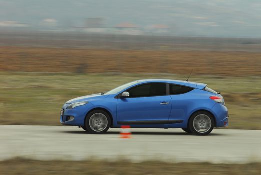 test drive a car at the test site with cones