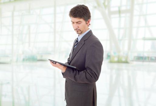 businessman working with a tablet pc, at the office