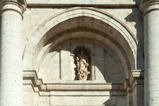 Valladolid, Spain - 8 December 2018: Catedral de Valladolid portal close up with a statue of Virgin