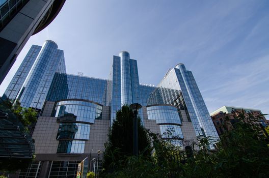 Brussels, Belgium, August 2019. External view of the modern metal and glass palaces which house the European Parliament.