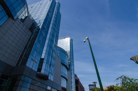 Brussels, Belgium, August 2019. External view of the modern metal and glass palaces which house the European Parliament.