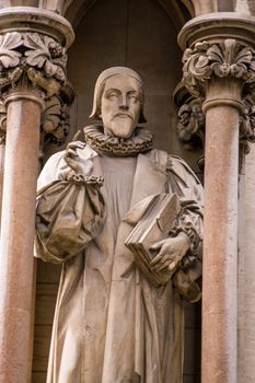 Statue of the former Bishop of Norwich, John Overall (1559 - 1619). One of the translators of the King James Bible. Chapel of St John's College, Cambridge. On public display since 1869.