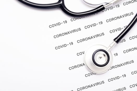 Stethoscope with Coronavirus and COVID-19 pattern words