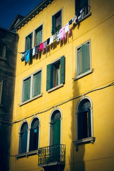 A venetian building in yellow