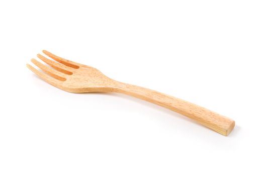 Wooden fork isolated on a white background.