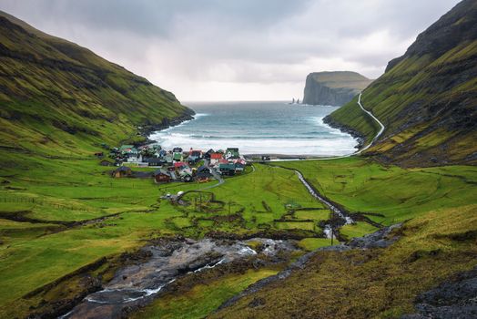 Village of Tjornuvik located on the coast of a beautiful bay in the Faroe Islands, Denmark.