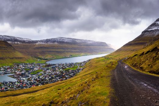 City of Klaksvik with a dirt road on Bordoy island, Faroe Islands, Denmark