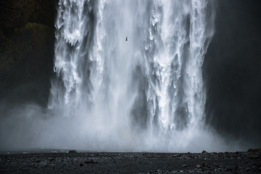 Closeup of the famous Skogafoss waterfall in Iceland. This waterfall is situated on the Skoga River in the south of Iceland at the cliffs of the former coastline.