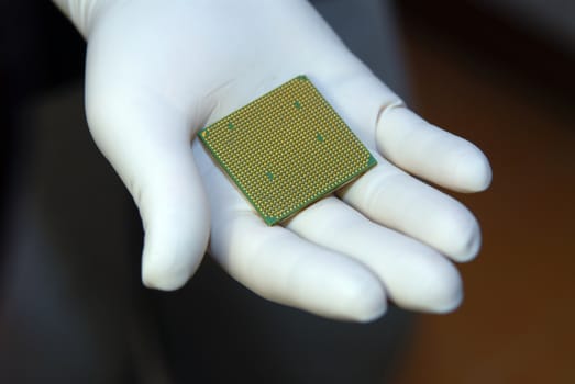 CPU processor in human hand