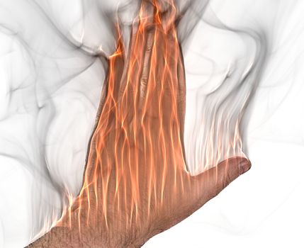 A human hand on fire burning with orange flames and some smoke in front of a white background