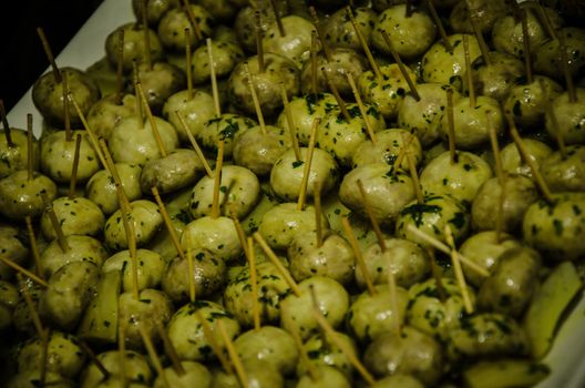 small cocktail potatoes sautéed over a fire with butter