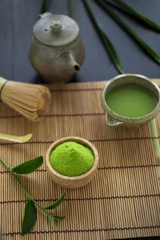 Set of matcha powder bowl wooden spoon and whisk green tea leaf Organic Green Matcha Tea ceremony.