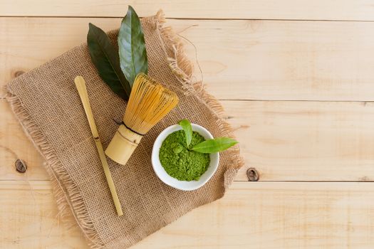 Set of matcha powder bowl, wooden spoon and whisk, green tea leaf, Organic Green Matcha Tea ceremony.