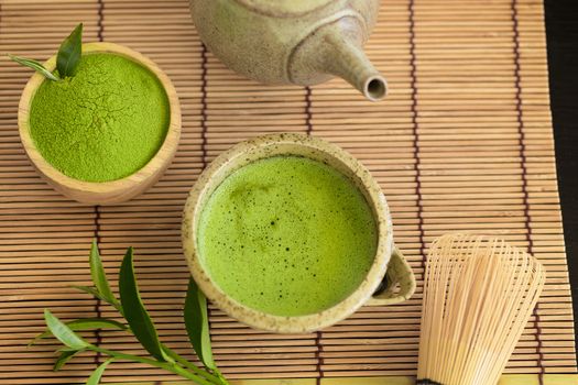 Set of matcha powder bowl wooden spoon and whisk green tea leaf Organic Green Matcha Tea ceremony.