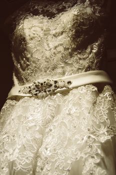 Wedding dress hanging on a coat rack