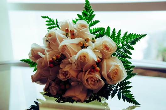 Bouquet of roses of a bride