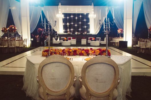 Grooms table with wedding party decoration background