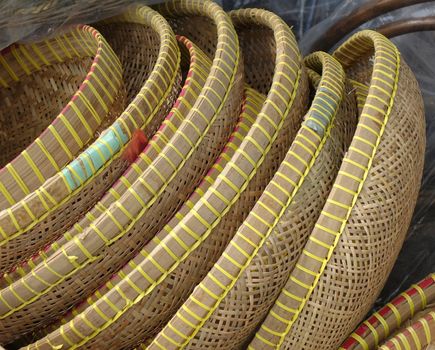 Handcrafted wicker baskets and trays at an outdoor market