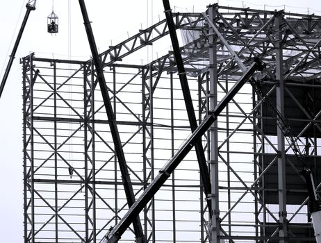 Monochrome image of a large steel structure construction