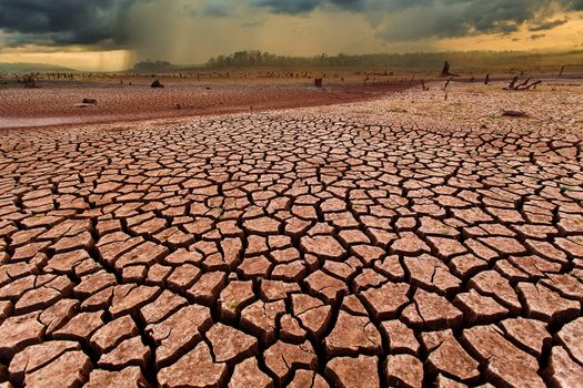 thunder storm sky Rain clouds Cracked dry land without wate