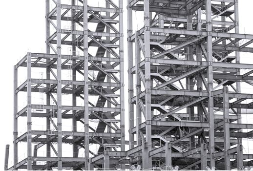 Monochrome image of a large steel structure for a construction project
