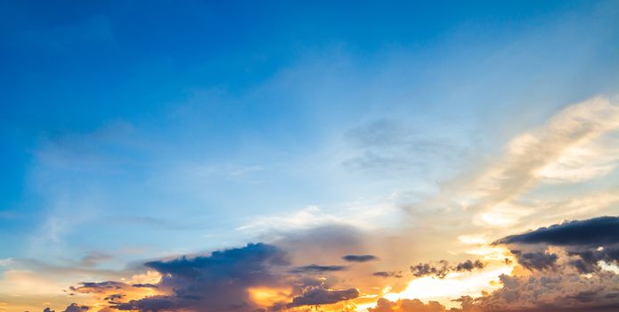 colorful dramatic sky with cloud at sunset