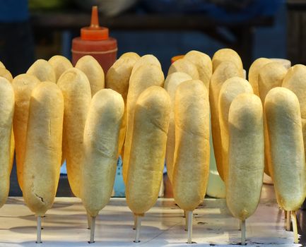 A fast food stand sells corn dogs