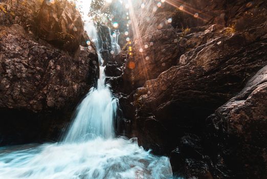 soft water of the stream in the natural park, Beautiful waterfall in rain forest