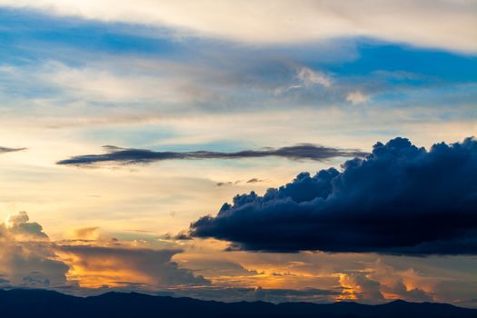 colorful dramatic sky with cloud at sunset