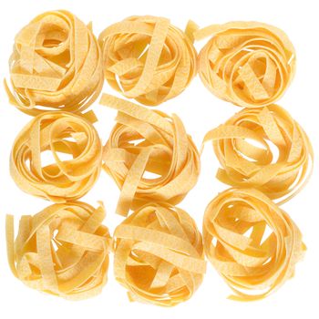 pasta pappardelle nest top view close up on a isolated white background.