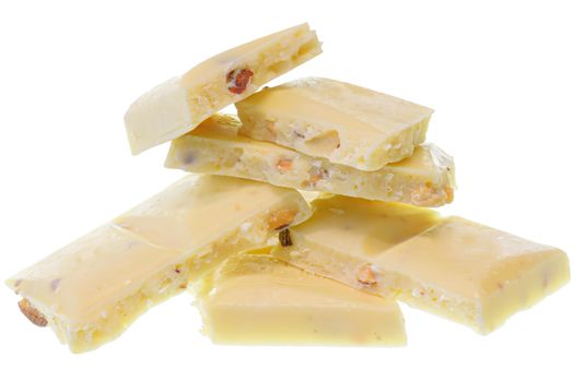 Broken white chocolate with whole almond nuts Isolated on a white background.