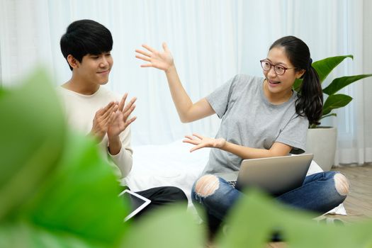 man woman friends using computer tablet. startup teamwork team feeling glad happy