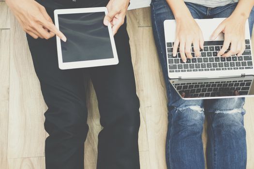 man woman friends using computer tablet. startup teamwork team working together at home