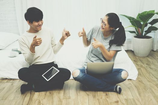 man woman friends using computer tablet. startup teamwork team feeling glad happy