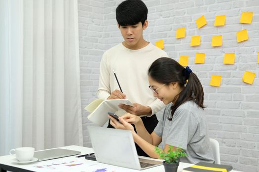 man woman colleagues analyzing data on computer startup teamwork coworking team working at home office