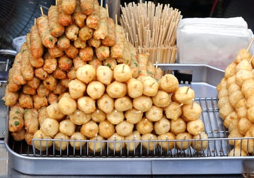 Deep fried balls and fish sausages made from minced fish and flour
