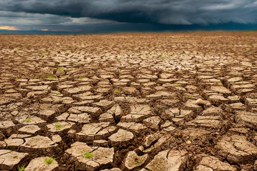 thunder storm sky Rain clouds Cracked dry land without wate