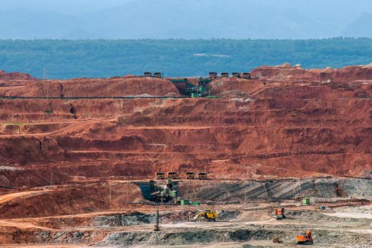 Part of a pit with big mining truck working