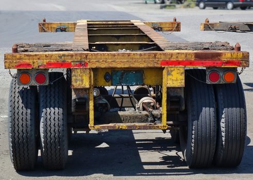 Large container trailer chassis used for transporting shipping containers
