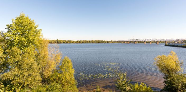 The Dnieper river and the Kiev's Petrovskyi railway bridge. It was built in 1929. During the Great Patriotic War it was ruined and restored after Kyiv liberation.