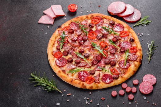 Pepperoni Pizza with Mozzarella cheese, salami, ham. Italian pizza on a dark background