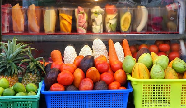 Baskets of fresh fruit are ready to be made into juice
