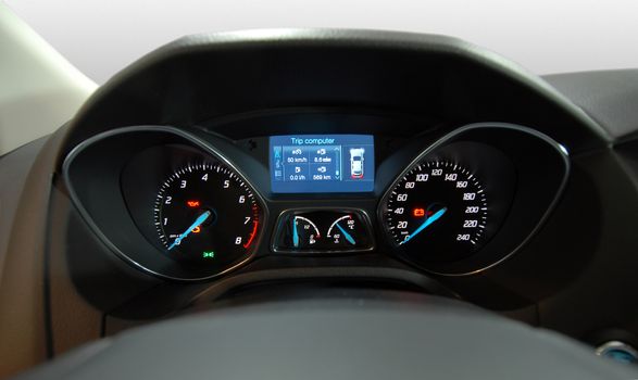 Modern car illuminated dashboard closeup